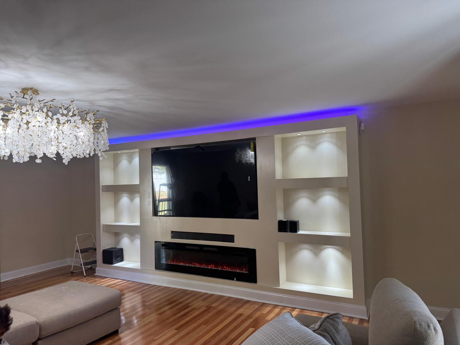 Finished media wall with blue LED cove light